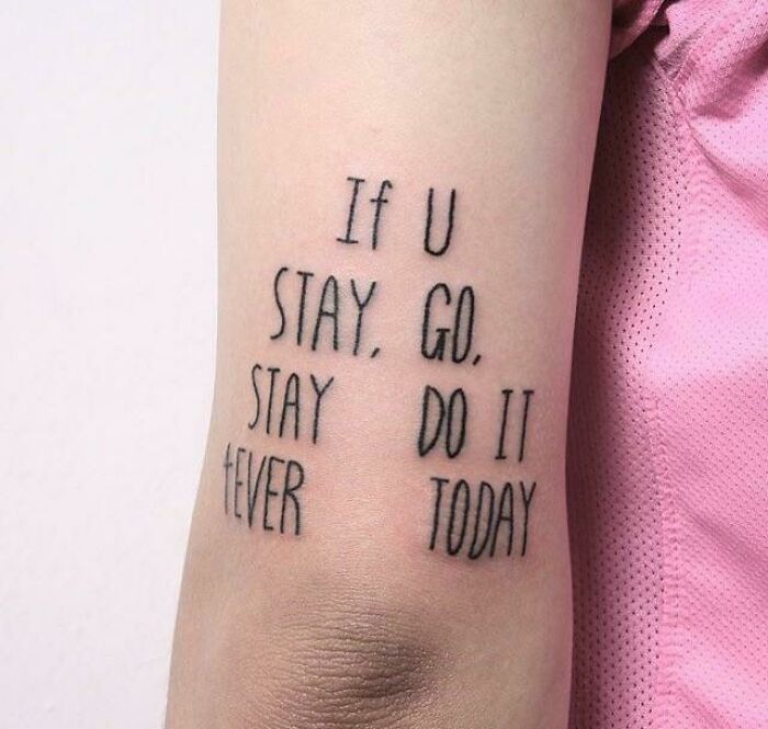 A tattoo with a confusing quote, If U Stay, Go. Stay Do It Fever Today, an impressive design fail.