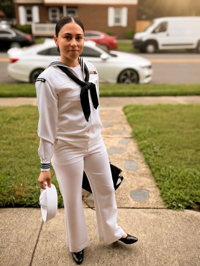 A woman in a navy uniform represents incredible accomplishments and motivation.