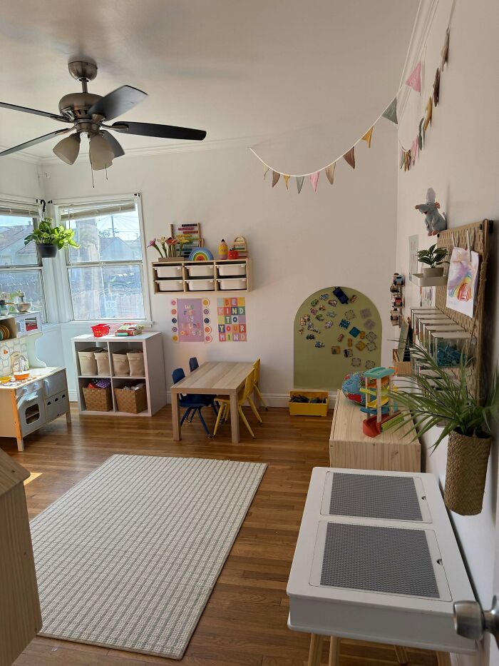 A colorful and organized play area for children, highlighting a family's incredible accomplishment in creating a nurturing space.