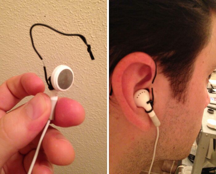 DIY earphones with a makeshift ear hook fashioned from a cable, a hilariously bad example of DIY.