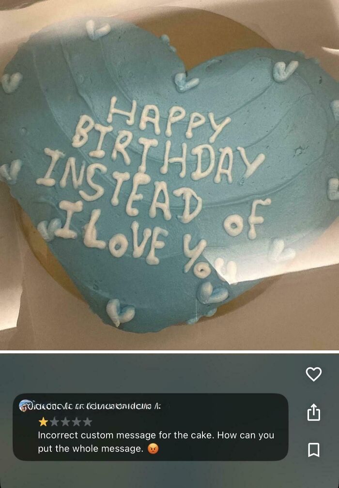 Funny fails: A heart-shaped cookie with blue frosting, incorrectly inscribed with Happy Birthday Instead of I Love You.