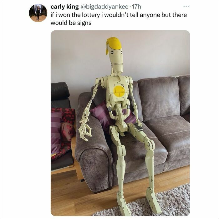 A screenshot of a tweet by carly king about winning the lottery, featuring a robot on a couch, perfect for hilarious memes while procrastinating.