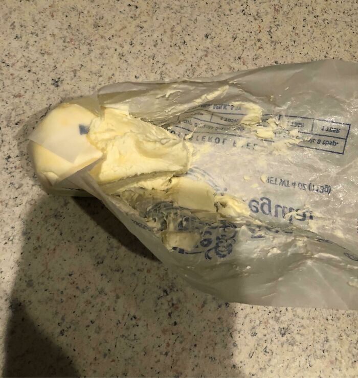 Melted butter in a plastic bag on a countertop, a mildly infuriating obstacle.