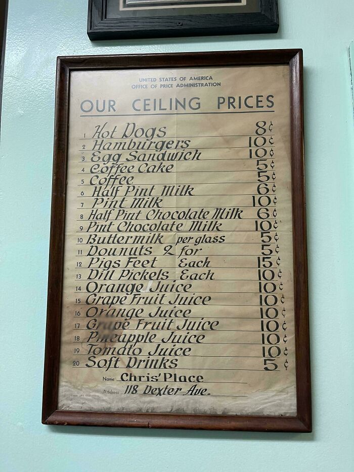 A vintage menu of ceiling prices from American history including hot dogs, hamburgers, and coffee.