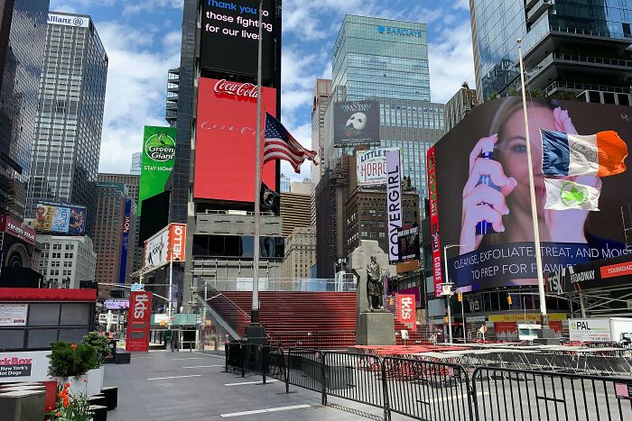 Times Square empty during a pandemic, a fascinating photo from American history, showing billboards.