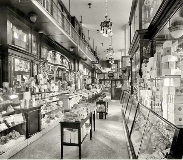Rare photo of a fascinating historic American department store interior with multiple display cases.