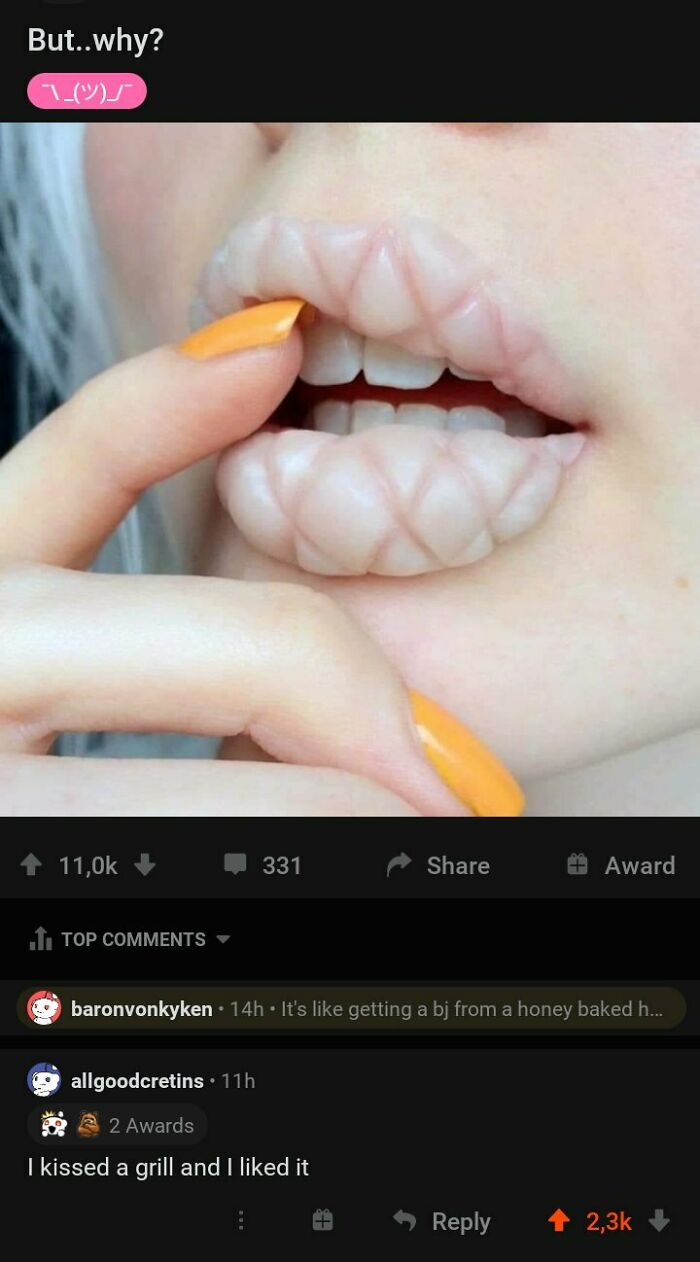 A close-up of a person's mouth with a clear, patterned mouthguard, creating blursed comments.