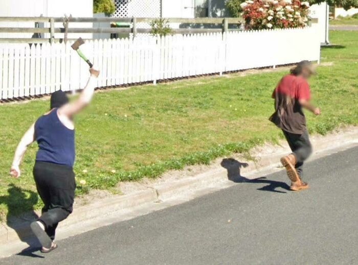 A blurred image from Google Maps shows one person chasing another with an axe, an odd thing found by people.