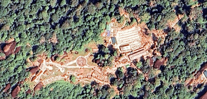 Odd things found on Google Maps: an archaeological site or large excavation surrounded by dense forest.