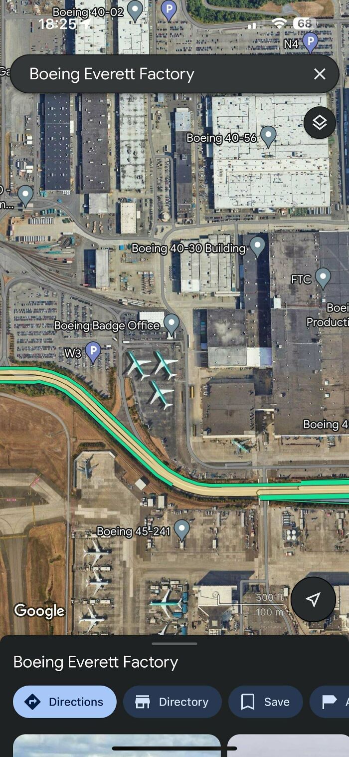 A detailed Google Maps view of the Boeing Everett Factory, highlighting a large industrial complex with several airplanes.