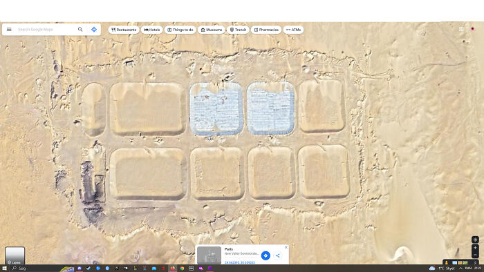 An expansive Google Maps view of rectangular, light-colored structures in a desert environment, possibly unusual constructions, an odd discovery.