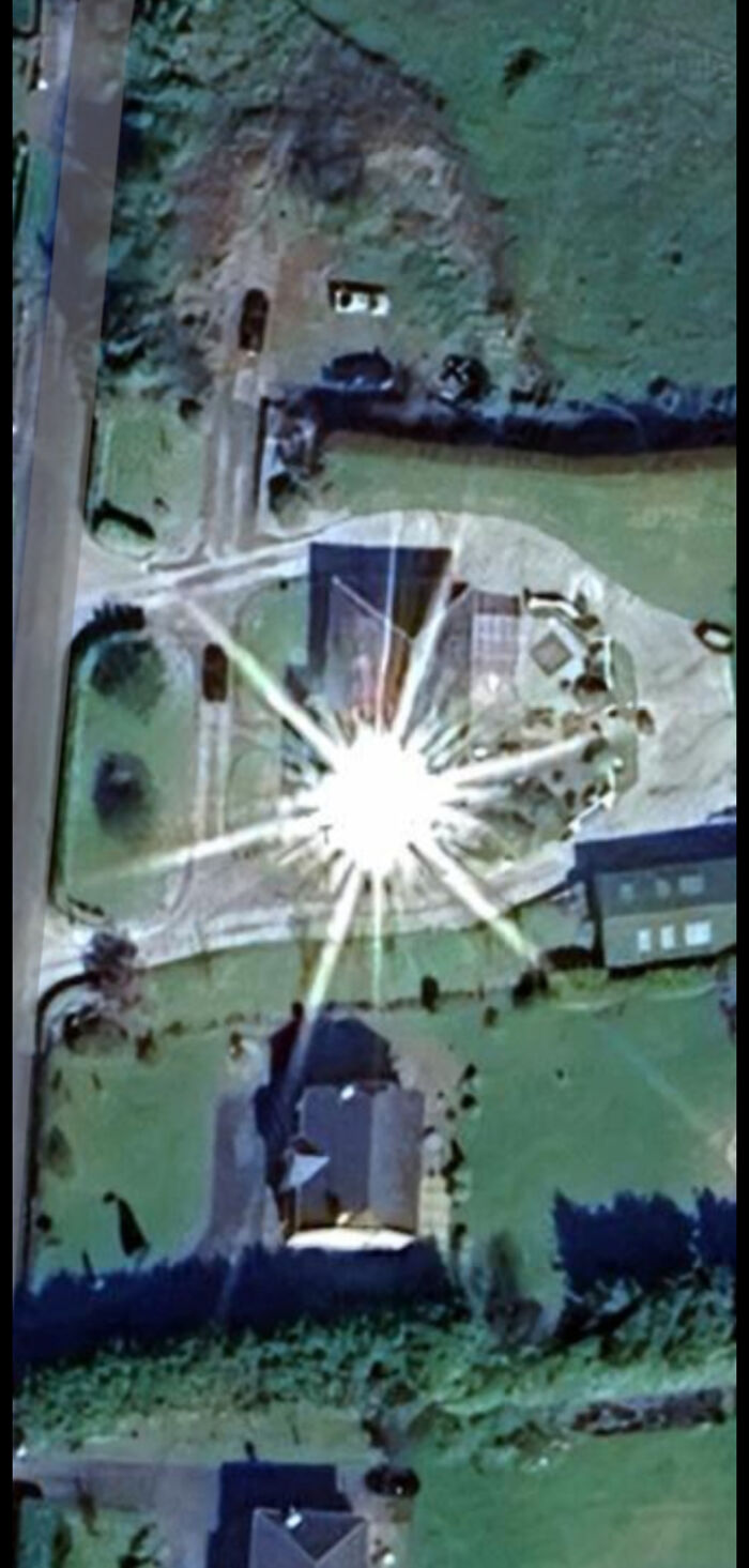 A bright, star-like flare of light from a house, an odd thing found on Google Maps.
