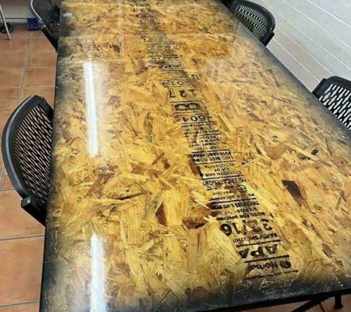 A dining table made from a sheet of particle board, disturbing levels of skill.
