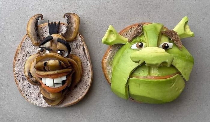 Two pieces of toast decorated to look like Shrek and Donkey, awful ideas with skill.