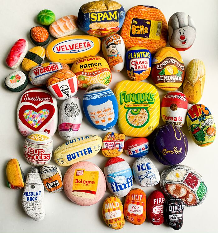 A collection of painted rocks resembling various food product packaging, showcasing amazing crafts.