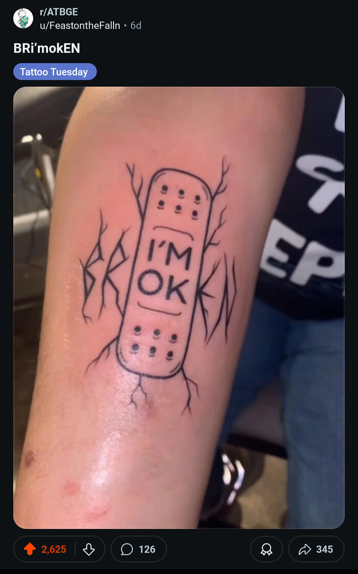 A tattoo of a broken bandage on an arm with the words I'M OK, an awful idea executed with skill.