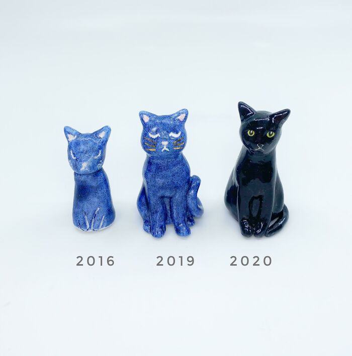 Three cat figurines in blue and black, dated 2016, 2019, and 2020, demonstrating amazing crafts evolution.