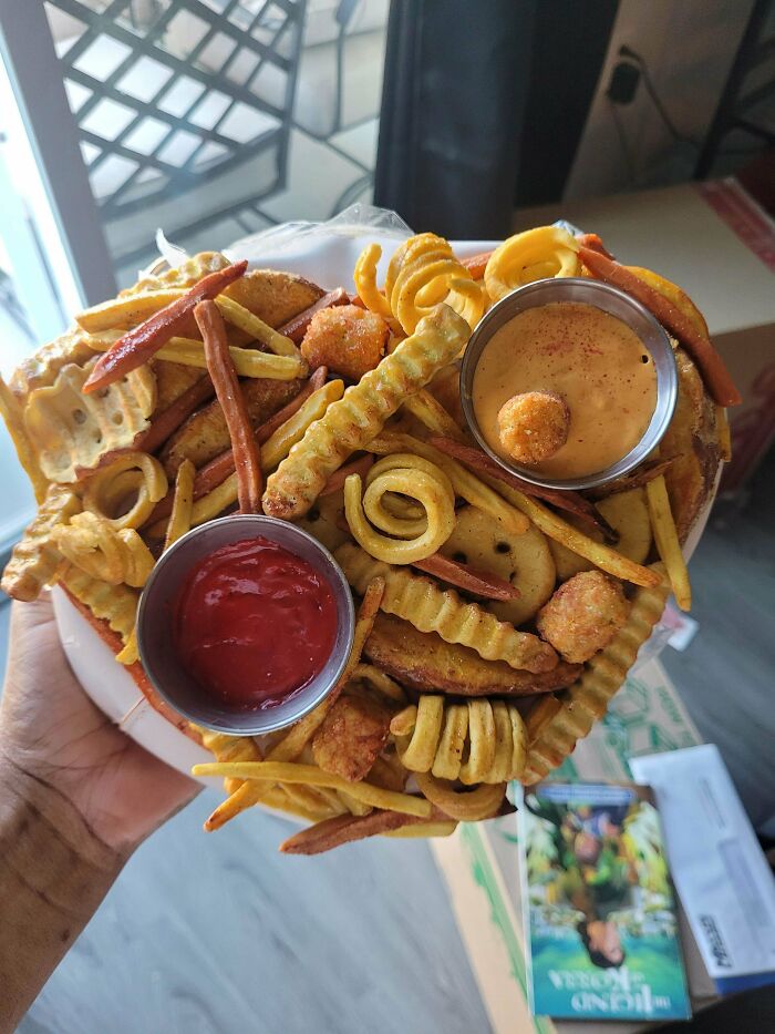 A diverse array of fries and sauces, an amazing craft showing people can go above and beyond with food.