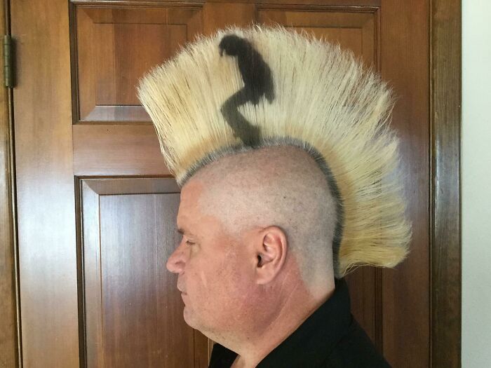 An awful idea of a man with a wild blonde mohawk haircut featuring a black silhouette, executed with skill.