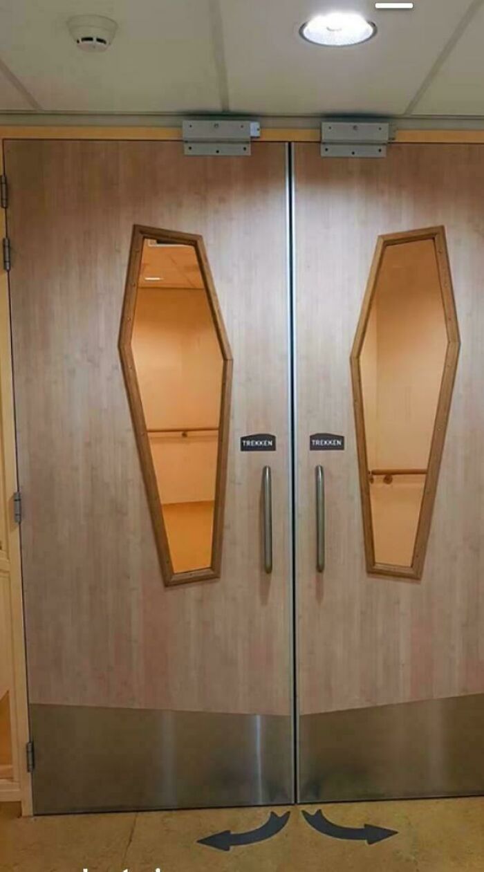 Doors with coffin-shaped windows, an awful idea executed with disturbing levels of skill.