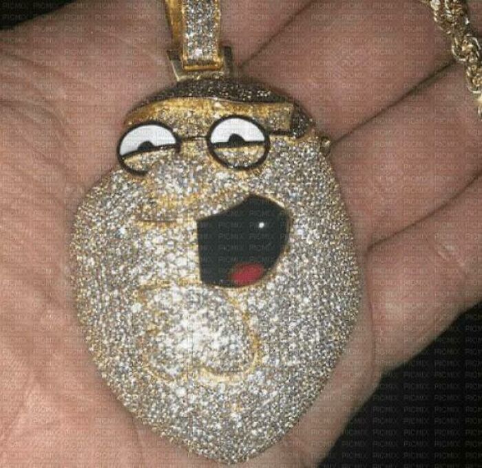 A diamond-encrusted pendant of a cartoon character, showing disturbing levels of skill for an awful idea.