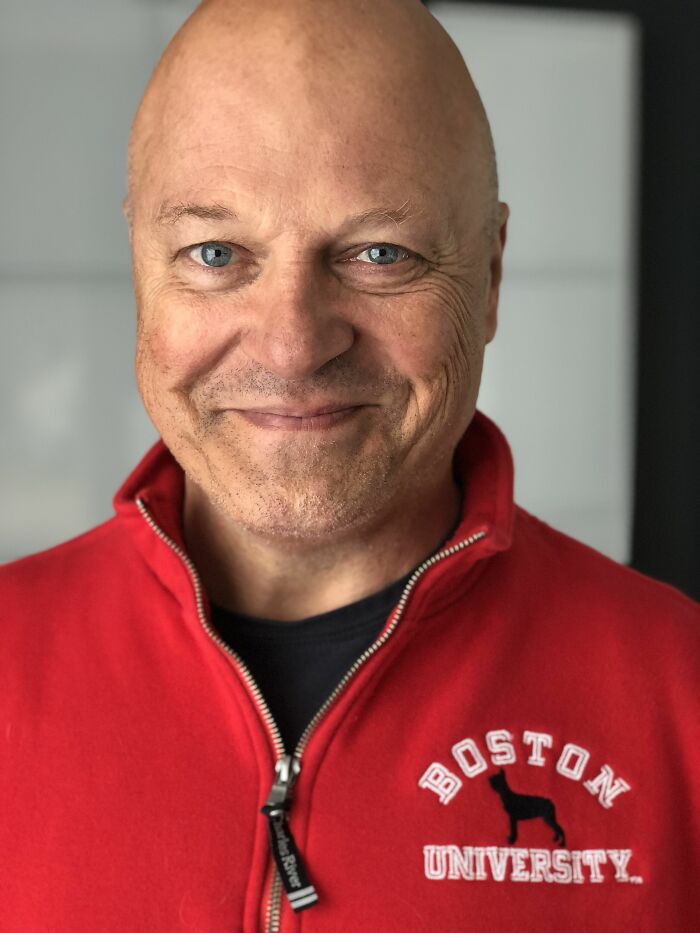 A close-up of Michael Chiklis smiling, highlighting his bio and career highlights.