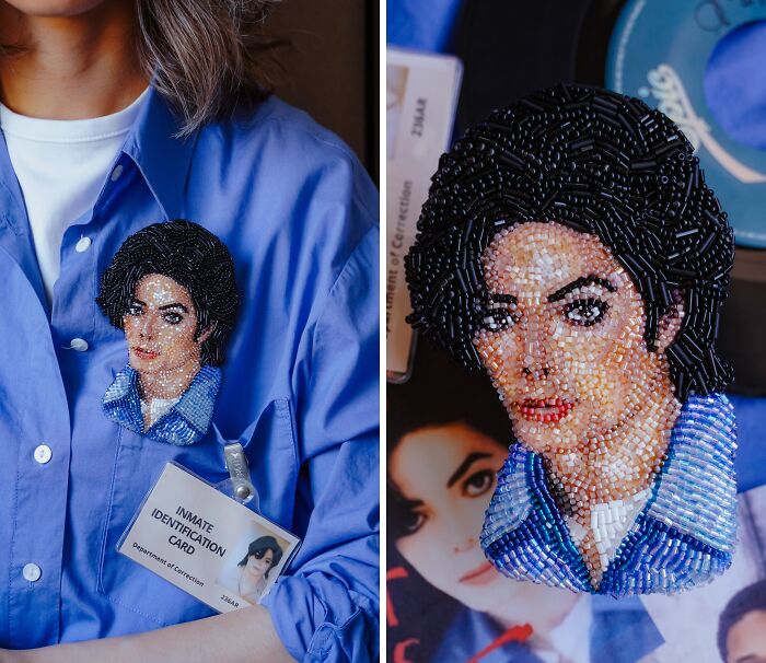 A close-up of a Michael Jackson beaded creation by Tiffany Pisani, featuring a detailed portrait brooch on a blue shirt.