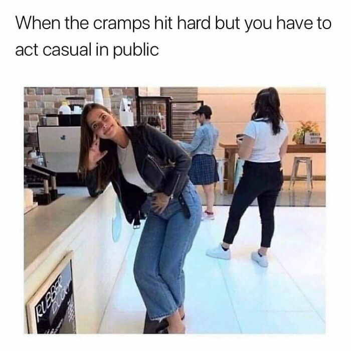Wholesome post: A woman subtly enduring cramps in public, acting casual for a tiny break.