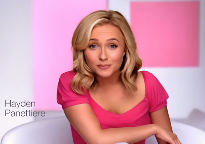 Hayden Panettiere in a pink top, image associated with her tragic passing, Neutrogena's stock tumble, and fan boycott.