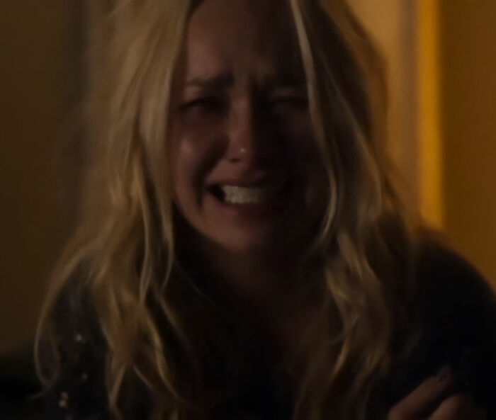 Hayden Panettiere crying in a dimly lit scene, expressing fury or sadness. Hayden Panettiere crying in a dimly lit scene, expressing fury or sadness.