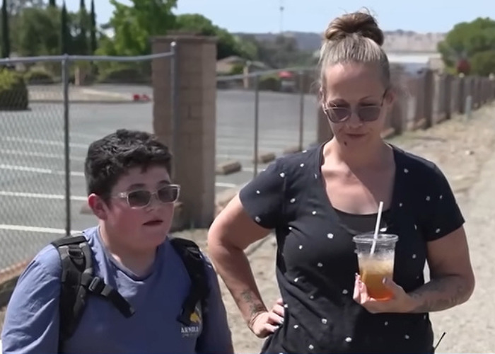 Furious parents waiting for their kids after the school bus driver refused to release kids. Furious parents waiting for their kids after the school bus driver refused to release kids.