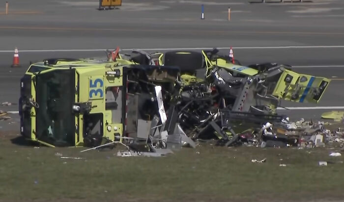 Debris of the crashed AirCanada aircraft after the incident, highlighting air traffic controllers' critical role. Debris of the crashed AirCanada aircraft after the incident, highlighting air traffic controllers' critical role.