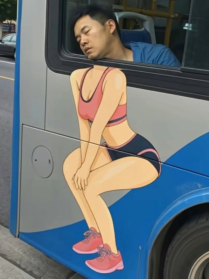 A photographer captures a sleeping man on a bus, his head perfectly aligned with a painted female body.