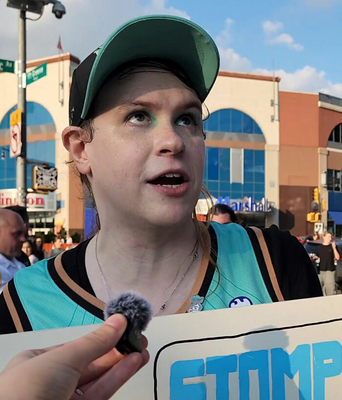 A reporter interviews an anti-trans protester who seems to fumble over a simple WNBA question. A reporter interviews an anti-trans protester who seems to fumble over a simple WNBA question.