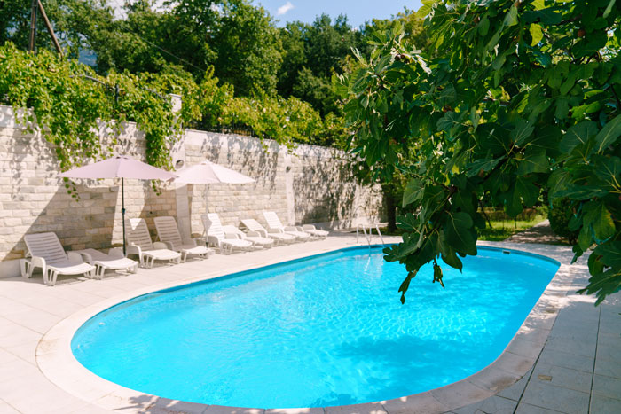 A beautiful, clean pool contrasts the squatter's filthy nightmare. This neighbor's pool becomes a squatter's bath. A beautiful, clean pool contrasts the squatter's filthy nightmare. This neighbor's pool becomes a squatter's bath.