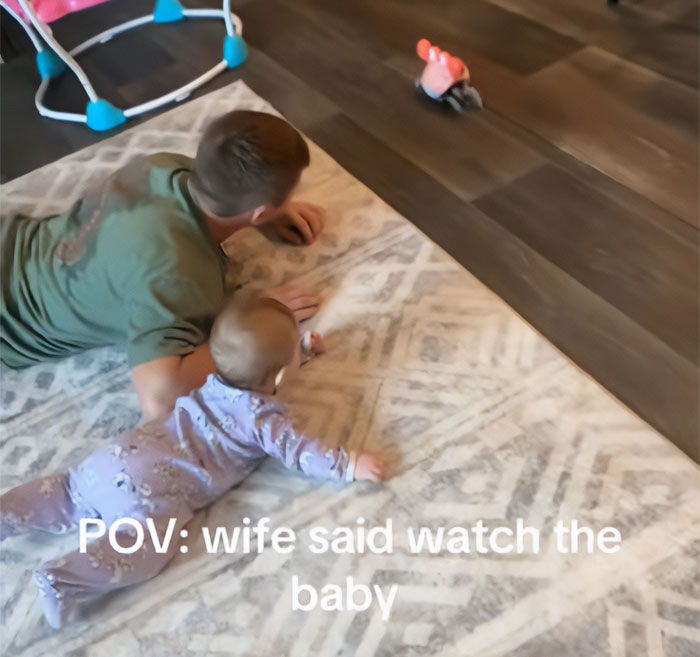 Man who married his cousin playing with a baby on the floor, asking the internet for advice. Man who married his cousin playing with a baby on the floor, asking the internet for advice.