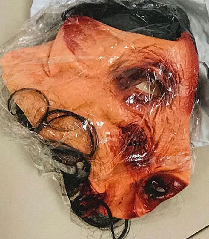 A disturbing, realistic mask with fake blood, a part of the eBay campaign against the old couple.