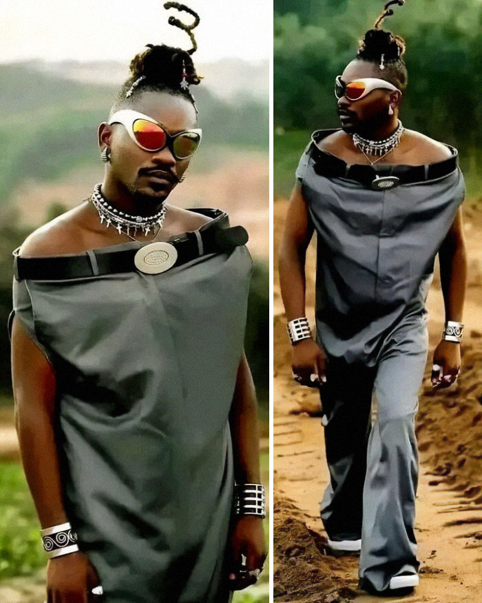 A man in two images wears an oversized gray off-the-shoulder outfit with chunky silver jewelry, a hilariously bad fashion crime.