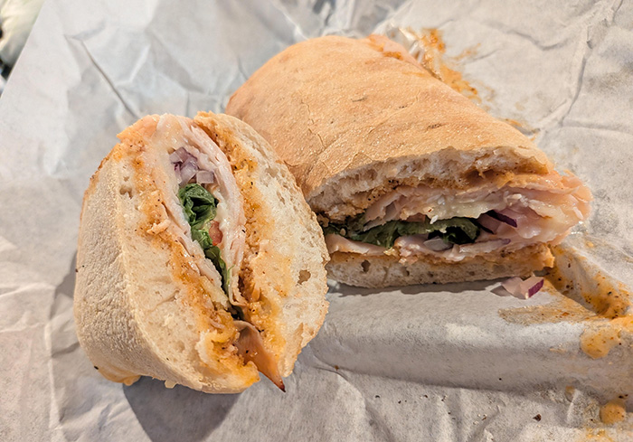 A delicious chicken rosemary chipotle sandwich, a treat for a woman and her own daughter. A delicious chicken rosemary chipotle sandwich, a treat for a woman and her own daughter.