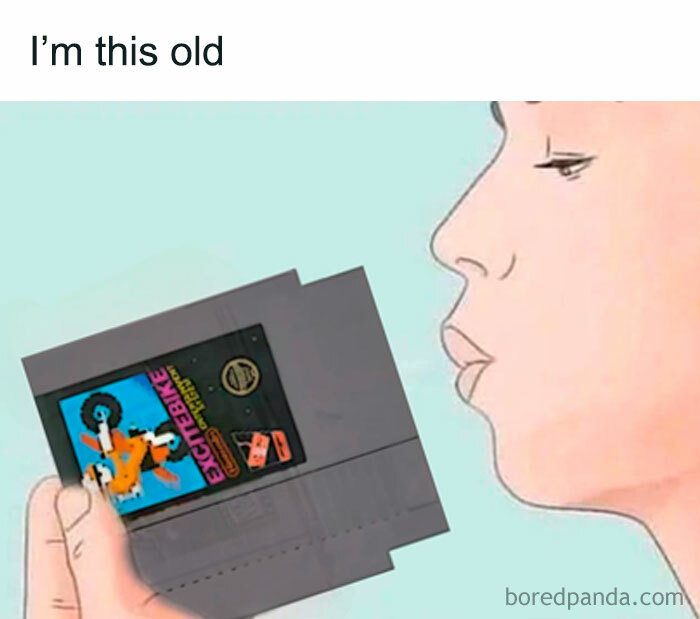 A '90s meme showing a person blowing into an NES Excitebike cartridge.