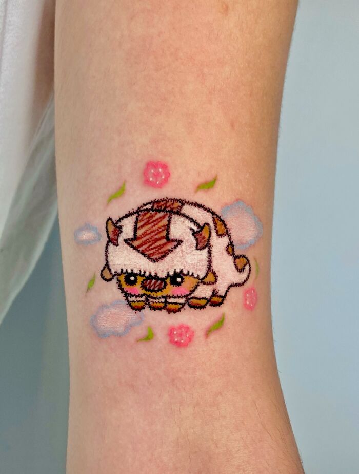 Adorably designed Appa tattoo, like a childhood crayon drawing, showcasing unfiltered creativity.