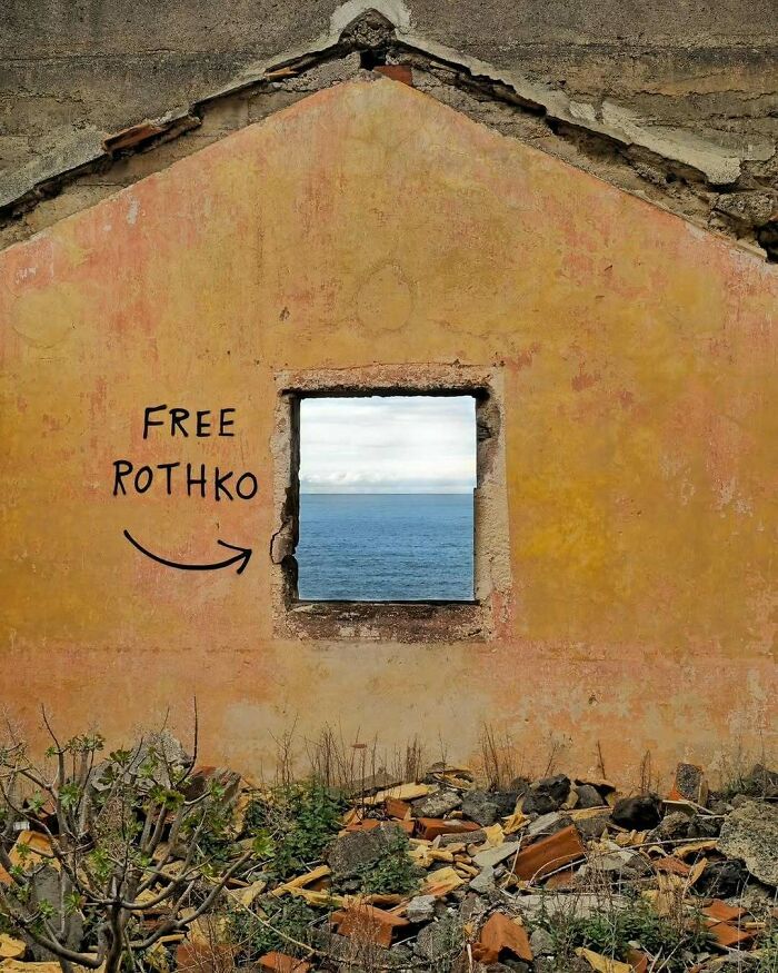 A brilliant and beautiful design featuring a ruined building with a window framing the sea and 'FREE ROTHKO' graffiti.