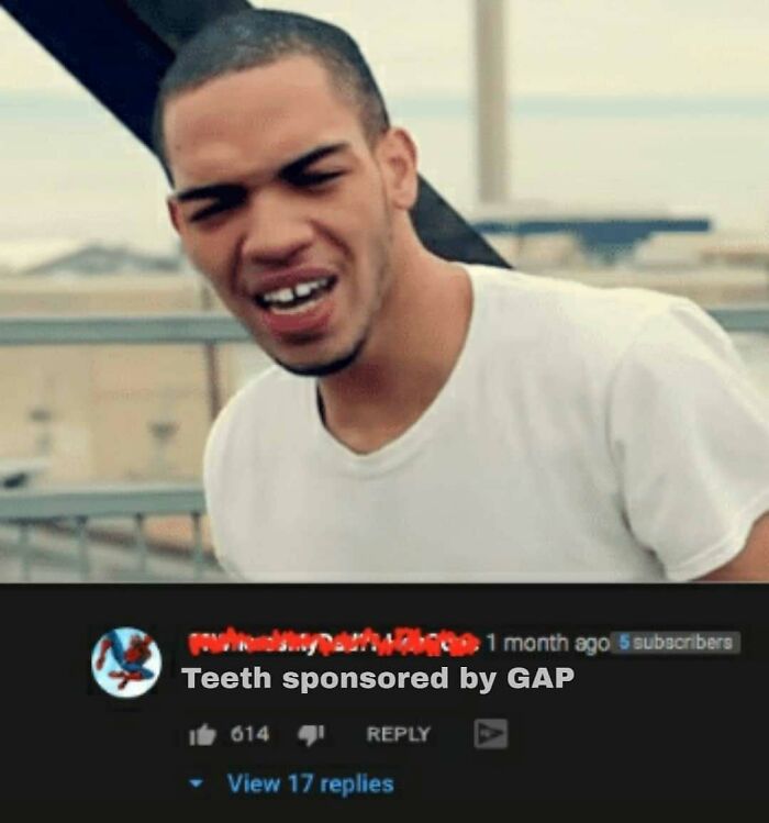 A man with a gap between his front teeth, featuring a creative and cursed comment about his teeth being sponsored by GAP.