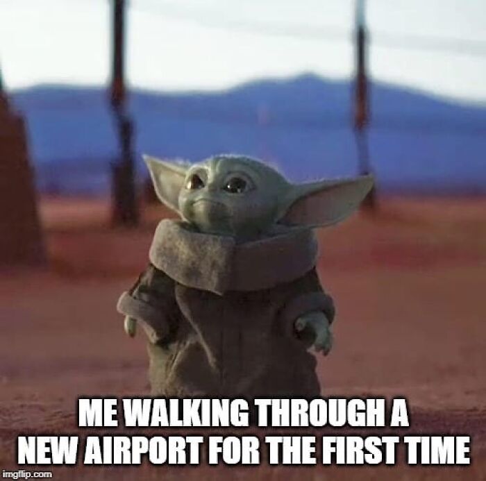 Baby Yoda walking through an airport, representing a travel meme about navigating new airports.