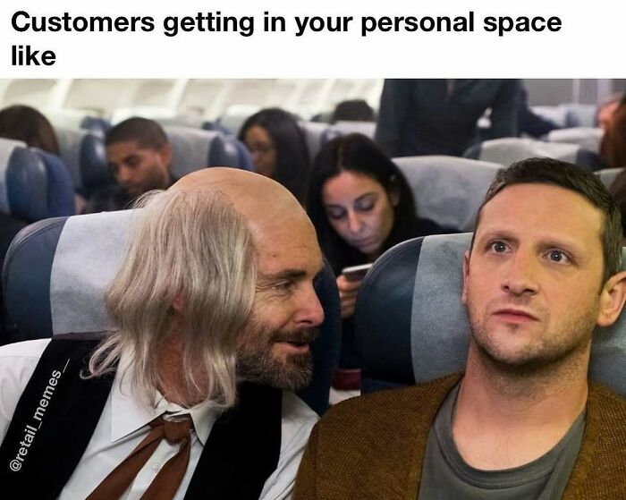 An uncomfortable man on a plane with a customer too close, illustrating retail memes about personal space.