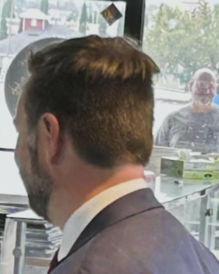 Back of a man's head with a short, somewhat messy hairstyle, demonstrating another bold hairstyle.