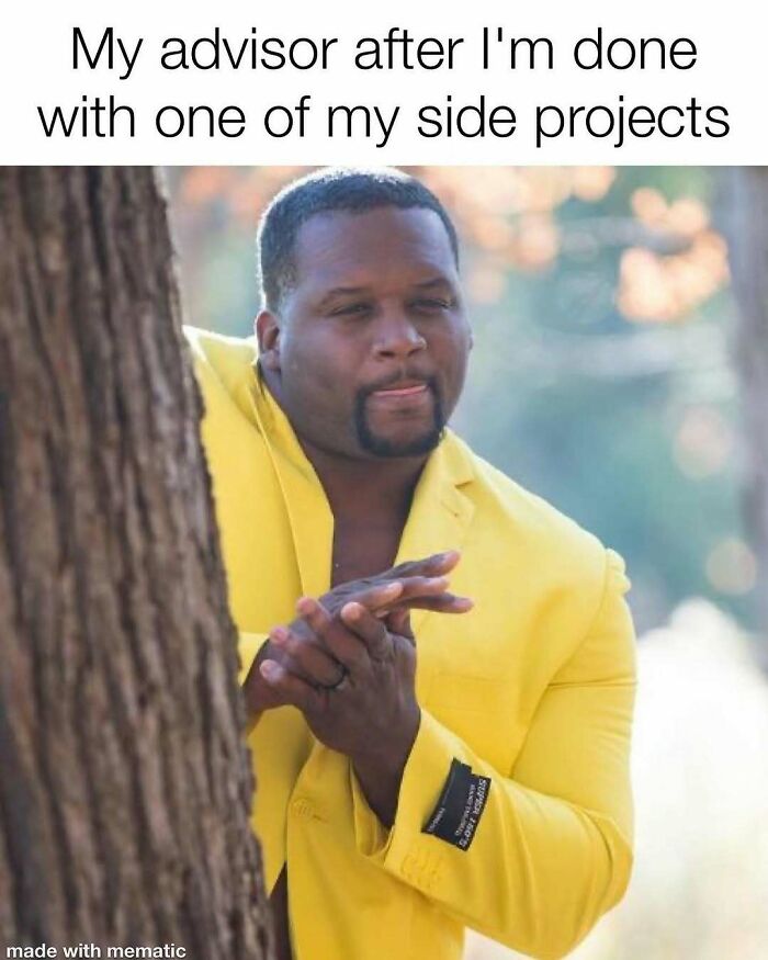 A man in a yellow jacket rubbing his hands together mischievously, representing a PhD advisor after a side project.