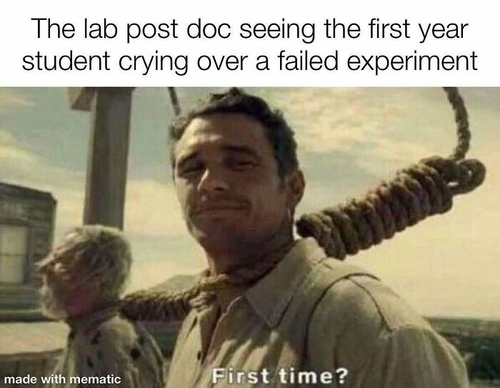 A PhD meme shows a man with a noose around his neck asking, First time? to a crying student, relating to PhD life.