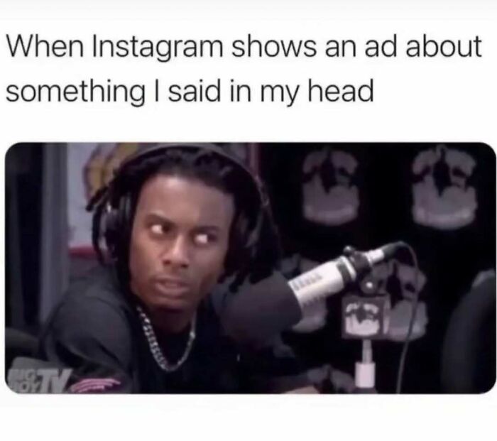 A meme queen with wide eyes, reacting to Instagram ads that relate to inner thoughts.