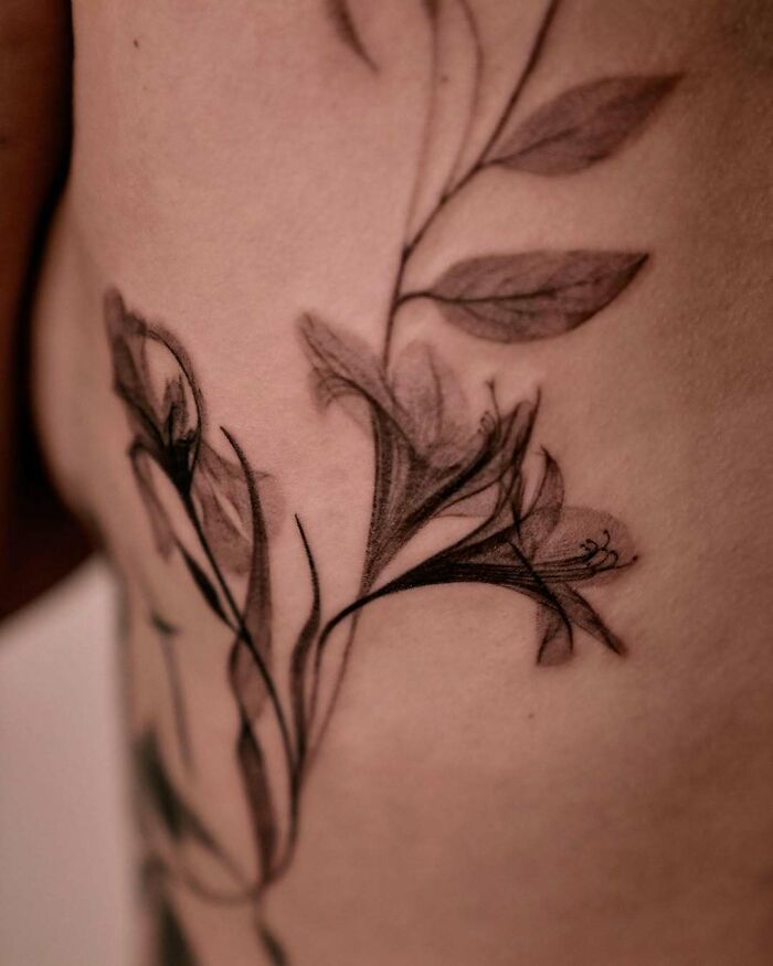 Floral x-ray tattoo ideas for women, a delicate design.